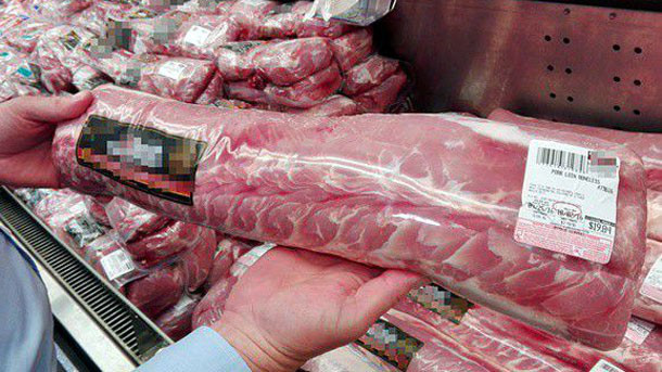 100% lô hàng thịt heo nhập khẩu phải đợi lấy mẫu kiểm tra theo quy định - Ảnh 1.