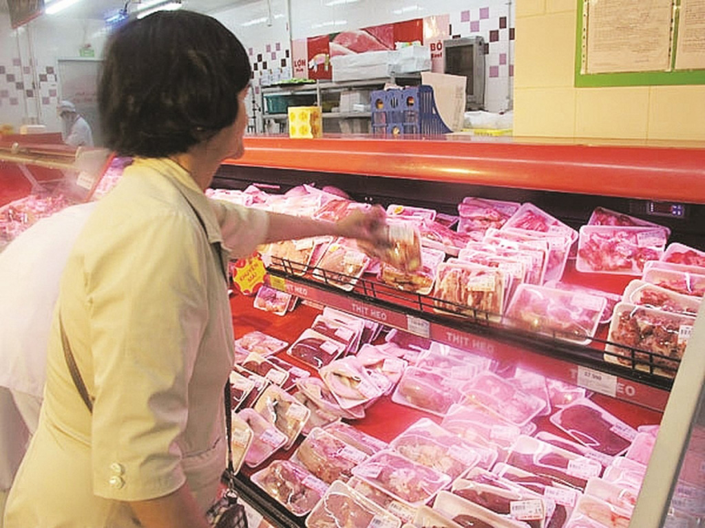 Thịt lợn nhập khẩu có giá rẻ như rau, tràn ra thị trường - Ảnh 1.