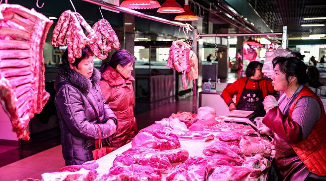 Chính phủ Trung Quốc xả kho 20.000 tấn thịt lợn ra thị trường - Ảnh 1.