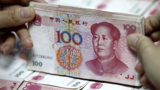 Trung Quốc phá giá tiền, hàng giá rẻ đổ vào Việt Nam nhiều hơn - Ảnh 1.
