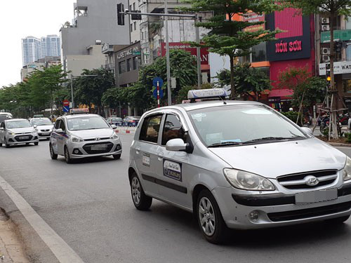 Chấm dứt tranh cãi taxi và xe công nghệ - Ảnh 1.