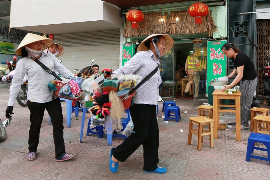 Bộ trưởng Bộ LĐTBXH ông Đào Ngọc Dung: Không chậm trễ nhưng không được chủ quan - Ảnh 1.