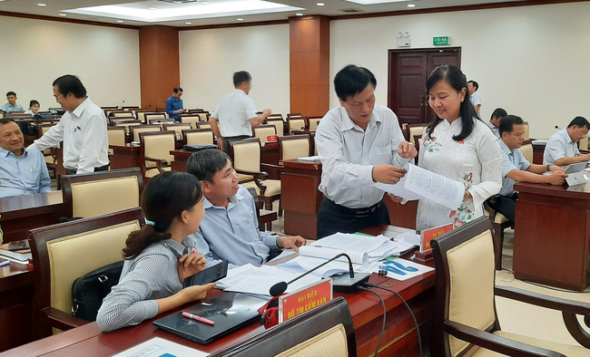 TP.HCM: Thành lập ban biên tập xây dựng đề án bỏ hội đồng nhân dân cấp quận, phường - Ảnh 1.
