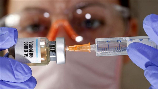 Bộ Y tế đã đăng ký mua vắc xin Covid-19 của Nga và Anh. - Ảnh 1.