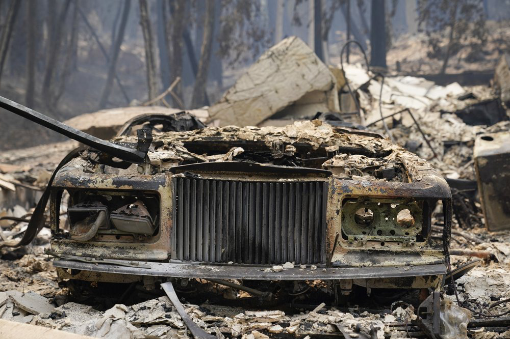 Ba cụm cháy lớn phá hủy hơn 1.000 căn nhà ở California - Ảnh 4.