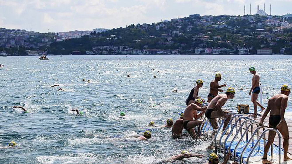 Gần 2.000 người tham gia cuộc thi bơi xuyên lục địa dài 6,5 km - Ảnh 6.