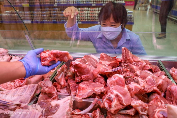 Người Việt tiêu thụ gần 25 kg thịt heo mỗi năm  - Ảnh 1.