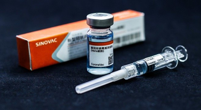 Công ty Trung Quốc cho hàng nghìn nhân viên tiêm vaccine Covid-19 - Ảnh 1.