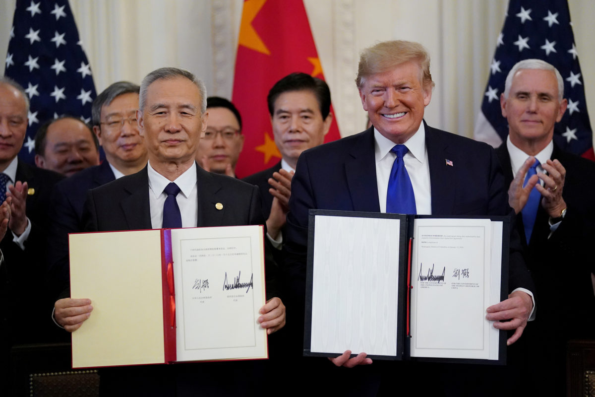 1 năm sau ngày ký thỏa thuận &quot;đình chiến&quot;, Trung Quốc lại thất hứa với Trump - Ảnh 1.
