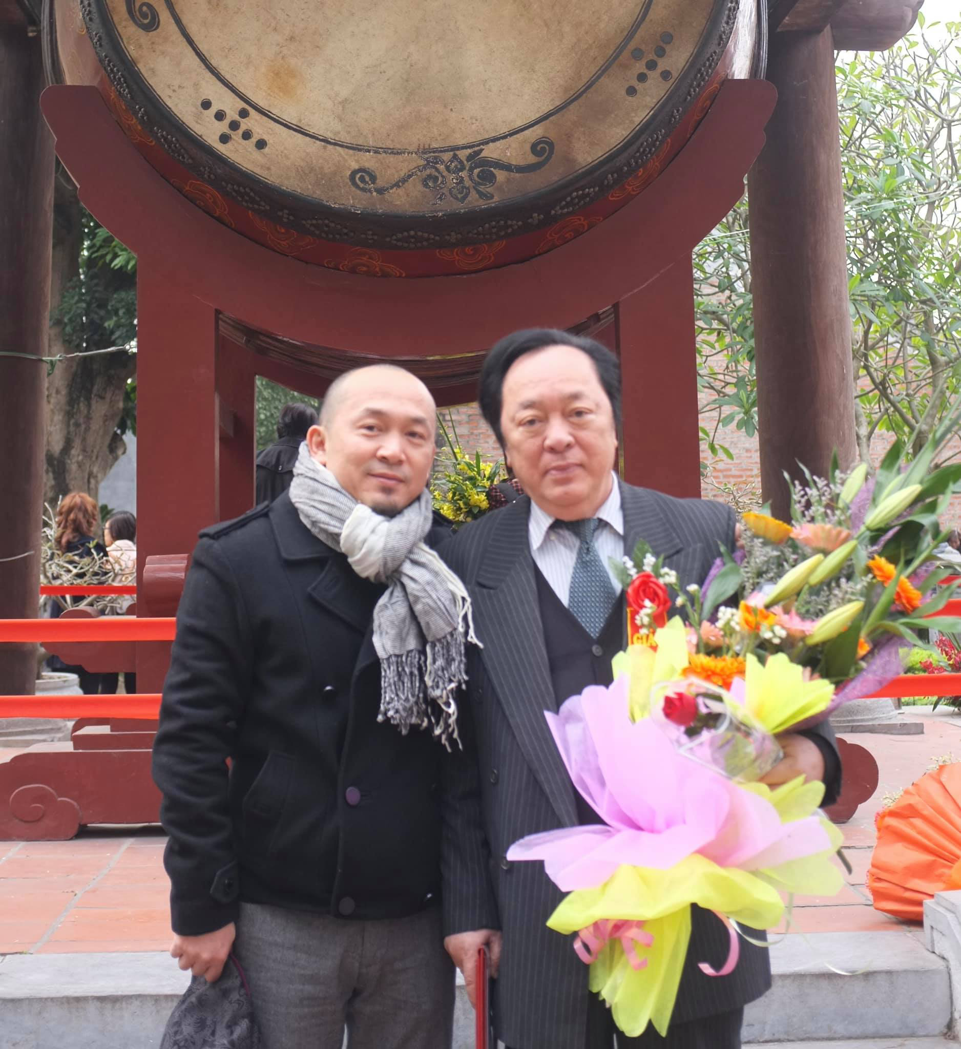 Nhạc sĩ Quốc Trung (trái) cùng bố ruột là cố NSND Trung Kiên.