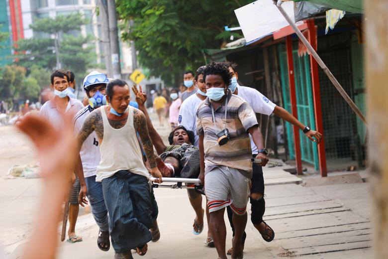 Ảnh thế giới 7 ngày qua: Xả súng tại Mỹ, biểu tình ở Myanmar là loạt ảnh ấn tượng tuần qua - Ảnh 3.