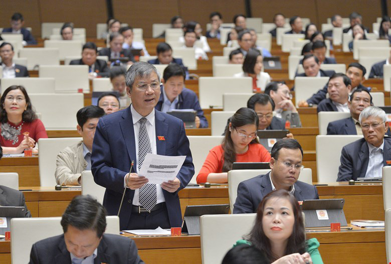 Bộ trưởng Công an Tô Lâm trả lời những &quot;trăn trở&quot; của ĐBQH tại Kỳ họp cuối của Quốc hội khoá XIV - Ảnh 3.