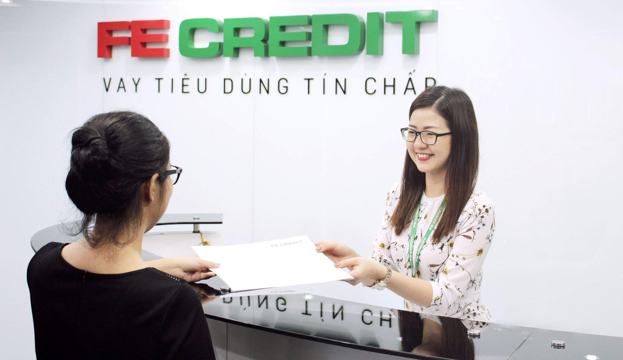 Phó TGĐ FE Credit: “Nếu không gọi điện thì cho vay tín chấp làm sao đòi nợ được” - Ảnh 2.