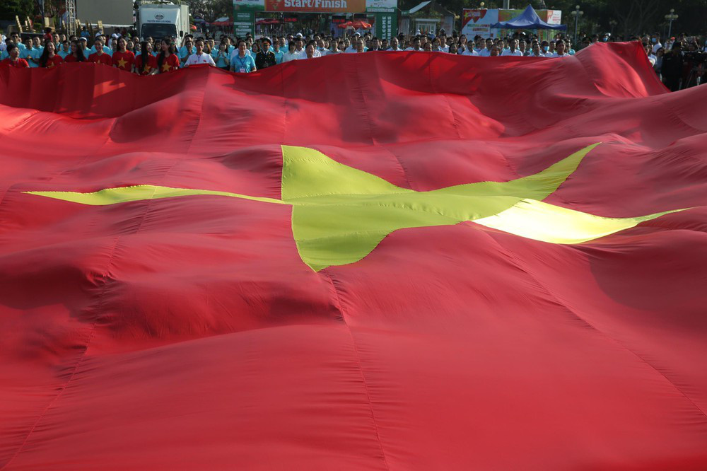 Lễ thượng cờ Tiền Phong Marathon 2021: Quốc kỳ Việt Nam tung bay với khát vọng hùng cường - Ảnh 7.