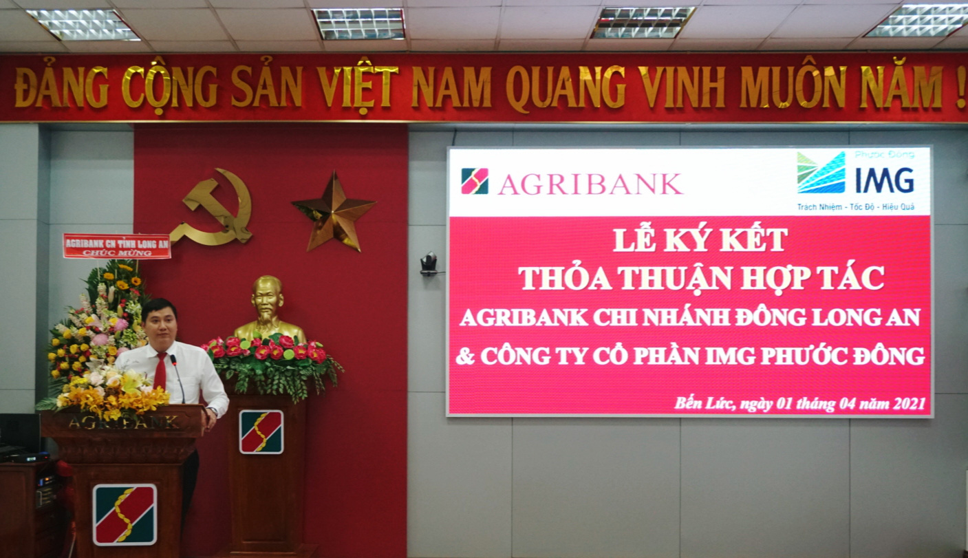 Agribank Chi nhánh Đông Long An ký kết thỏa thuận hợp tác toàn diện với Công ty cổ phần IMG Phước Đông. - Ảnh 3.