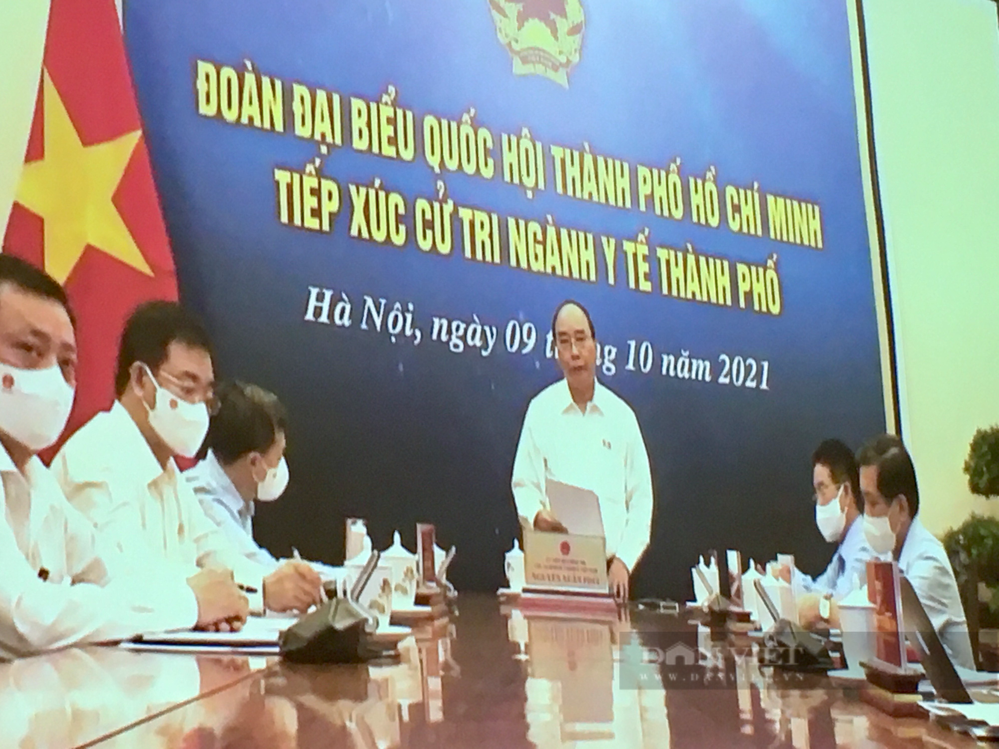 Chủ tịch nước Nguyễn Xuân Phúc: Chuyển từ chiến lược &quot;zero Covid&quot; sang thích ứng an toàn với Covid-19 - Ảnh 1.