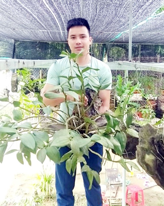 Lào Cai: Hotboy núi rừng làm giàu từ nghề trồng lan phi điệp, gia tài là vườn lan rừng vạn người mê - Ảnh 1.