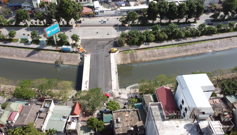 Chiêm ngưỡng cây cầu bắc qua sông Tô Lịch gần 38 tỷ đồng nối 2 quận ở Hà Nội - Ảnh 9.
