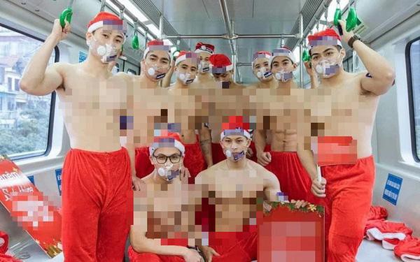 Nhóm thanh niên cởi trần quảng cáo sản phẩm trên tàu Cát Linh - Hà Đông: Lãnh đạo Hanoi Metro nói gì? - Ảnh 1.