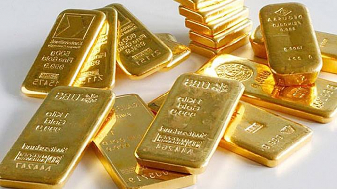 Giá vàng hôm nay 18/12: Đồng đô la mạnh lên khiến vàng mất giá trị 0,6 USD - Ảnh 2.