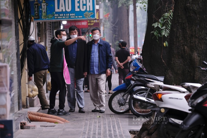 Dừng ăn uống tại chỗ ở “vùng cam”, dân sang “vùng vàng”, Hà Nội có nên thay đổi phương án chống dịch? - Ảnh 1.