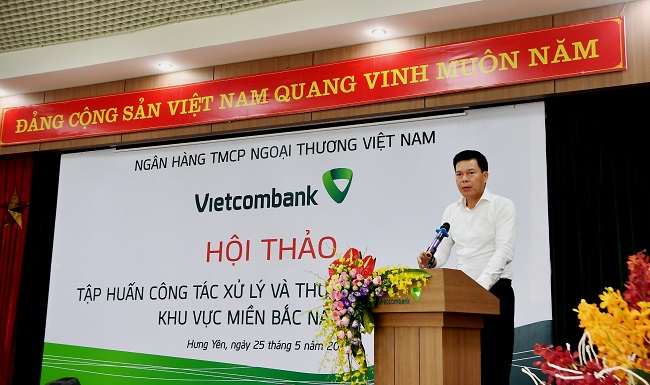 Vietcombank quyết liệt trong công tác kiểm soát và xử lý nợ xấu trong giai đoạn hậu Covid-19 - Ảnh 1.