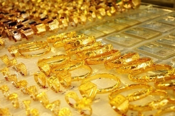 Giá vàng hôm nay 5/12: Vàng bốc hơi 0,1% giá trị, biến thể Omicron đe dọa - Ảnh 1.