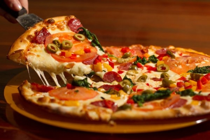 Chuyện thú vị về sự ra đời của bánh pizza - Ảnh 1.