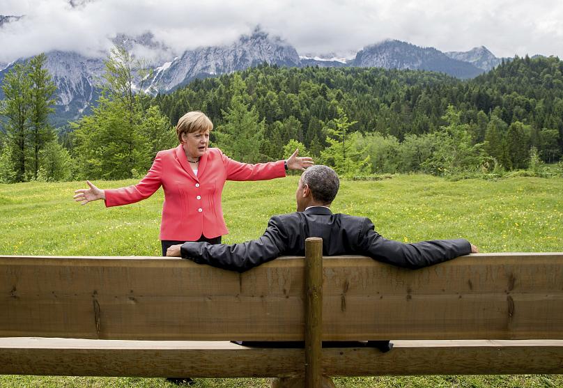 Những hình ảnh đẹp nhất của bà Merkel trong 16 năm cầm quyền - Ảnh 4.