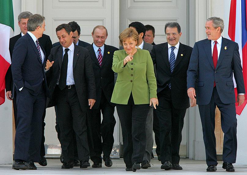 Những hình ảnh đẹp nhất của bà Merkel trong 16 năm cầm quyền - Ảnh 7.