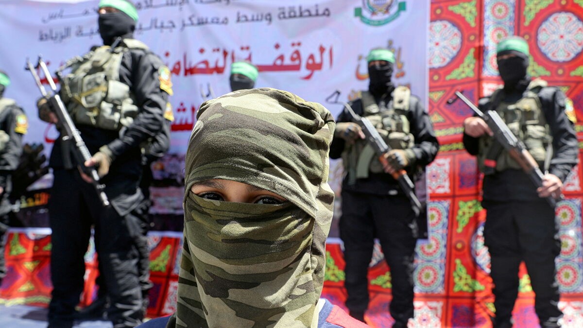Hamas cảnh báo sẽ tiếp tục giữ trạng thái chiến đấu bất chấp lệnh ngừng bắn - Ảnh 1.