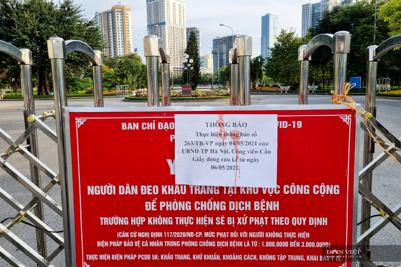 Công viên đóng cửa, vỉa hè thành nơi tập thể dục mới của người dân Thủ đô - Ảnh 2.