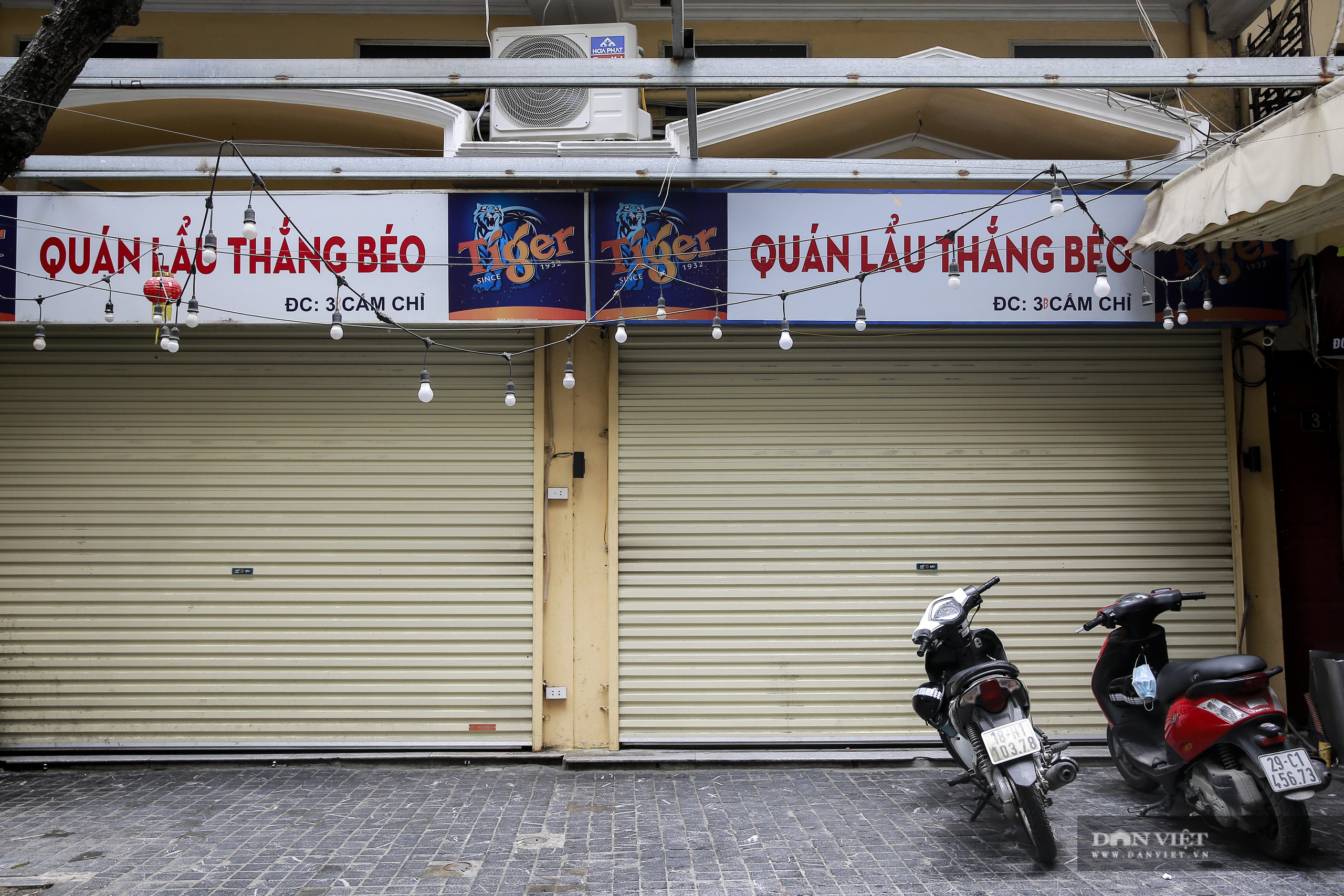 Những phố ẩm thực “không ngủ” tại Hà Nội đóng cửa hàng loạt vì Covid-19 - Ảnh 10.
