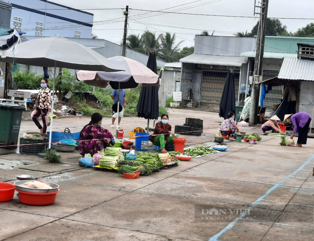 Ngày đầu giãn cách xã hội ở miền Tây: Đường sá, chợ truyền thống vắng người - Ảnh 10.