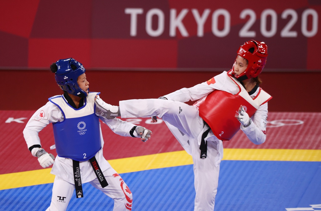Olympic Tokyo 2020: Đánh bại võ sĩ Canada, Trương Thị Kim Tuyền gặp &quot;núi&quot; ở tứ kết - Ảnh 1.