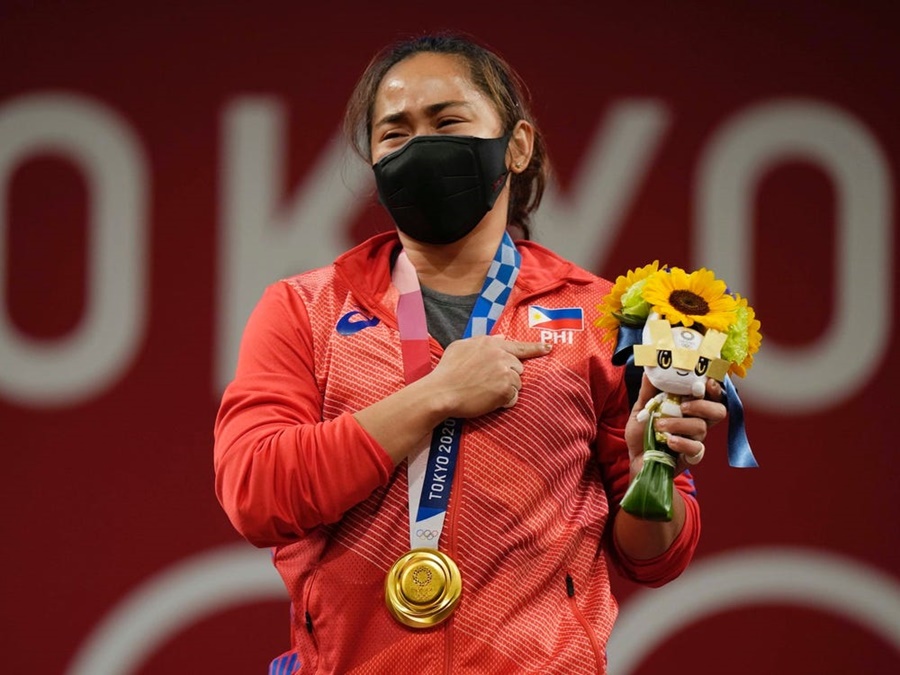 9 kiểu thưởng huy chương Olympic kỳ quặc: Từ biệt thự đến… xúc xích, bia, bò - Ảnh 9.