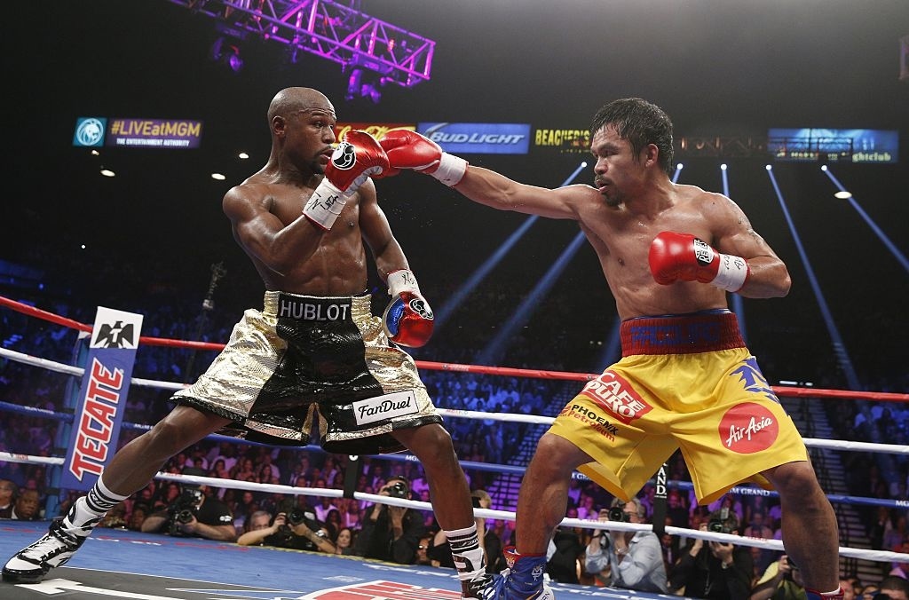 &quot;Độc cô cầu bại&quot; Mayweather giải nghệ 4 năm, Pacquiao vẫn gạ tái đấu - Ảnh 1.