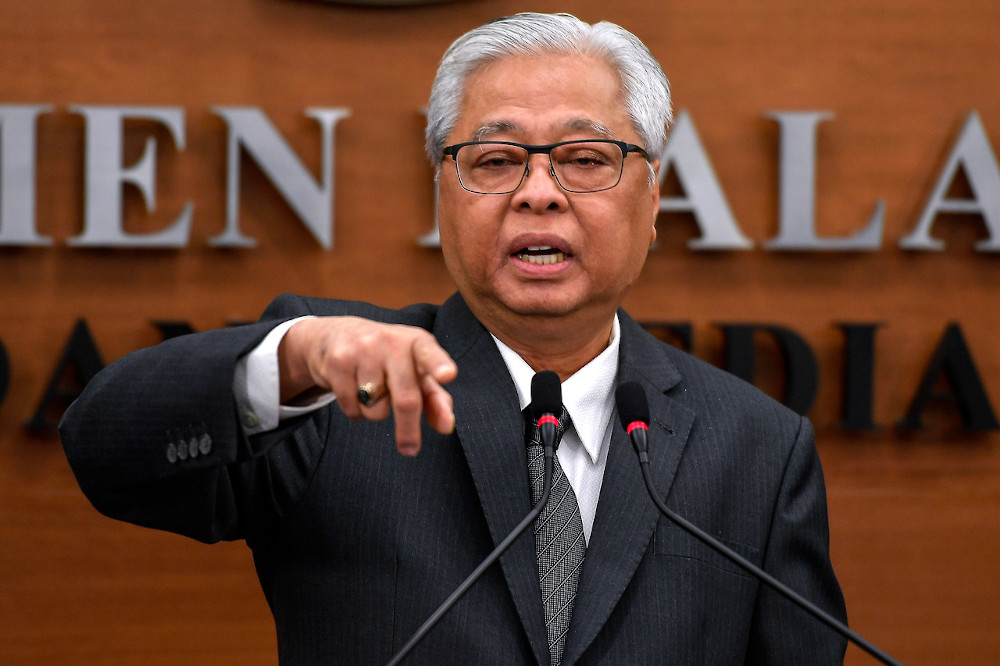 Nhậm chức vội vàng, Tân Thủ tướng Malaysia đối diện thách thức kinh tế lớn chưa từng có - Ảnh 1.