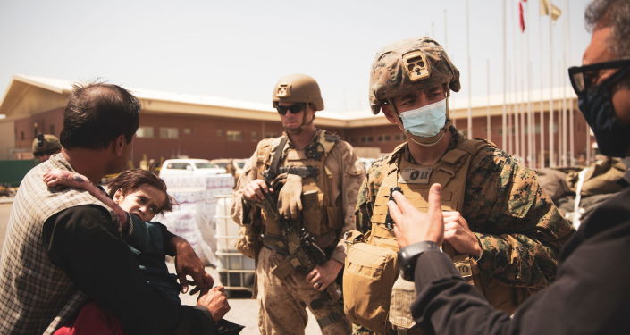 Nhà Trắng cho biết quân đội Mỹ phải đối mặt với nguy cơ bị ISIS-K tấn công - Ảnh 1.