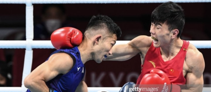 Olympic 2020: Thua chủ nhà, võ sĩ Trung Quốc tố trọng tài thiên vị - Ảnh 1.