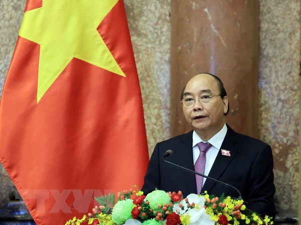 Chủ tịch nước Nguyễn Xuân Phúc lên đường thăm hữu nghị chính thức Lào - Ảnh 1.