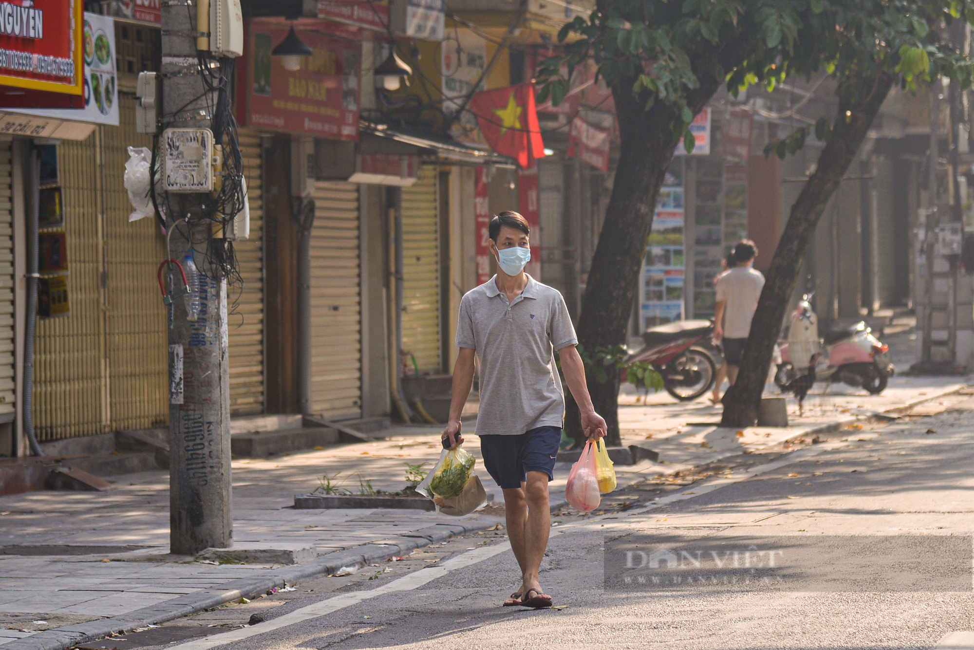 Hà Nội: Dỡ bỏ một số chốt trong nội thành, nhiều cửa hàng mở cửa trở lại - Ảnh 11.