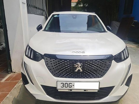 Ngỡ ngàng giá xe Peugeot 2008 2021 lướt bán lại cao hơn xe mới - Ảnh 1.