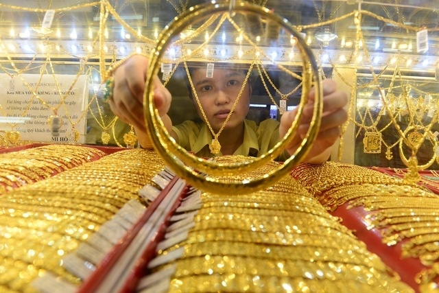 Ngày vía Thần Tài 2022, giá đang cao kỷ lục nên mua vàng thế nào? - Ảnh 1.