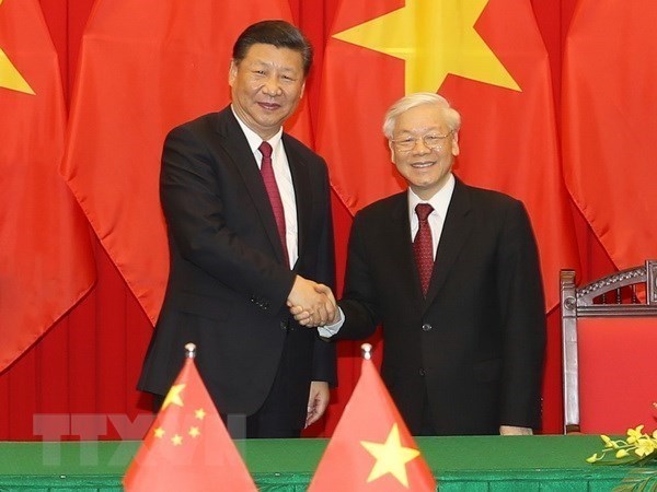 Các lãnh đạo cấp cao Việt Nam - Trung Quốc trao đổi điện mừng - Ảnh 1.