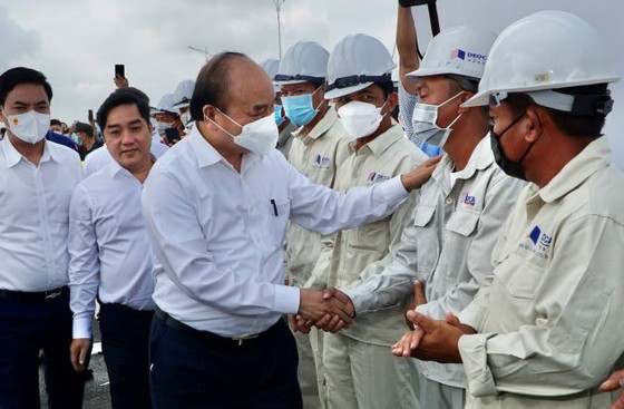 Chủ tịch nước Nguyễn Xuân Phúc dự lễ thông xe kỹ thuật cao tốc Trung Lương - Mỹ Thuận - Ảnh 12.