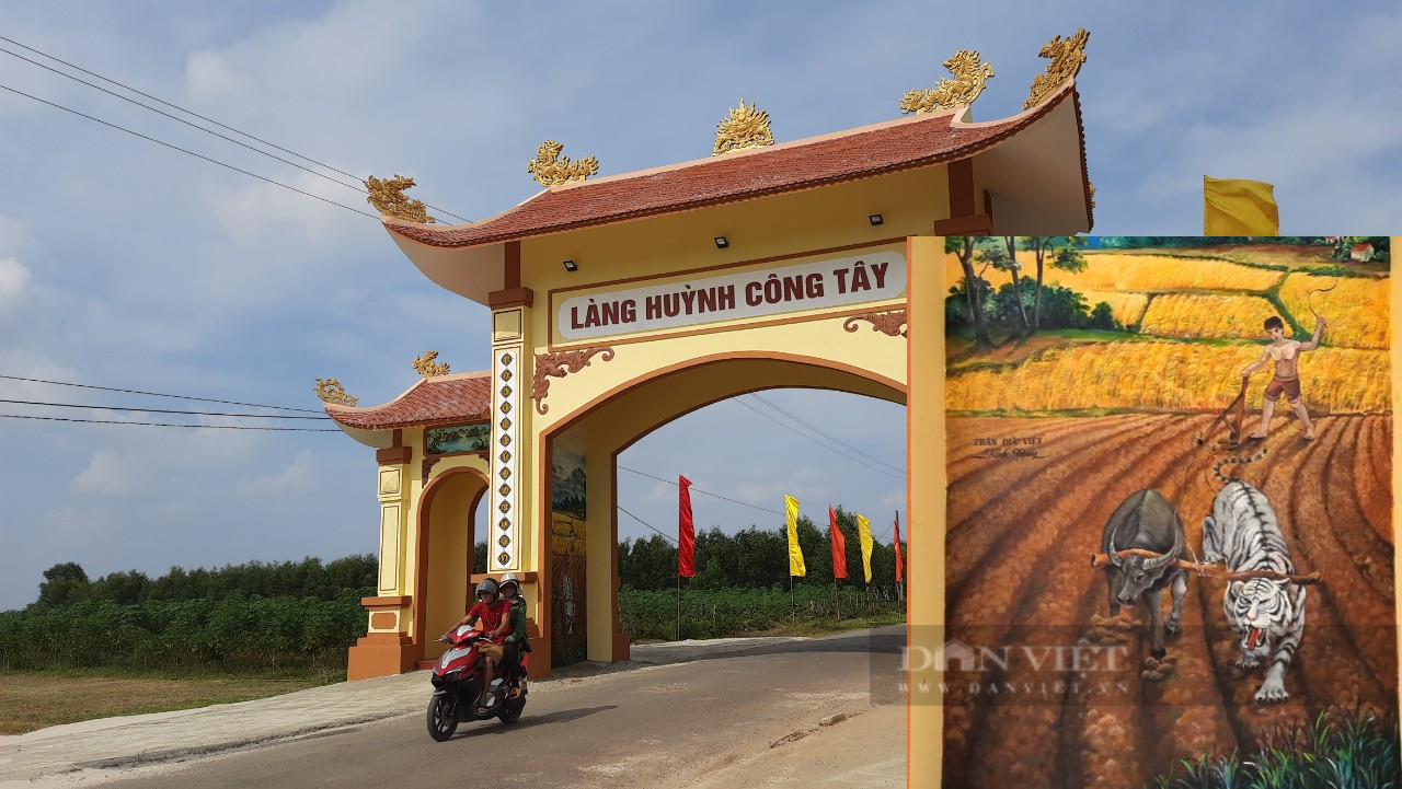 Bức hoạ bắt hổ đi cày ở cổng làng Huỳnh Công Tây đã cho thấy chất trạng truyền thống của người làng Huỳnh Công. Ảnh: Ngọc Vũ.