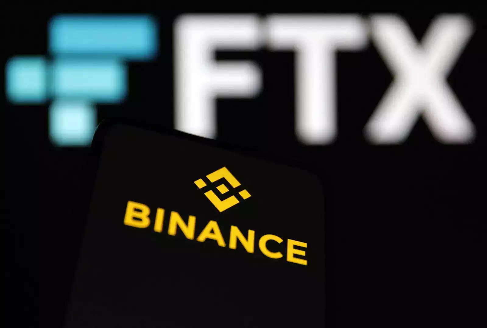 Hậu nộp đơn xin bảo hộ phá sản từ sàn FTX, sàn Binance bắt đầu rục rịch. Ảnh: @AFP.