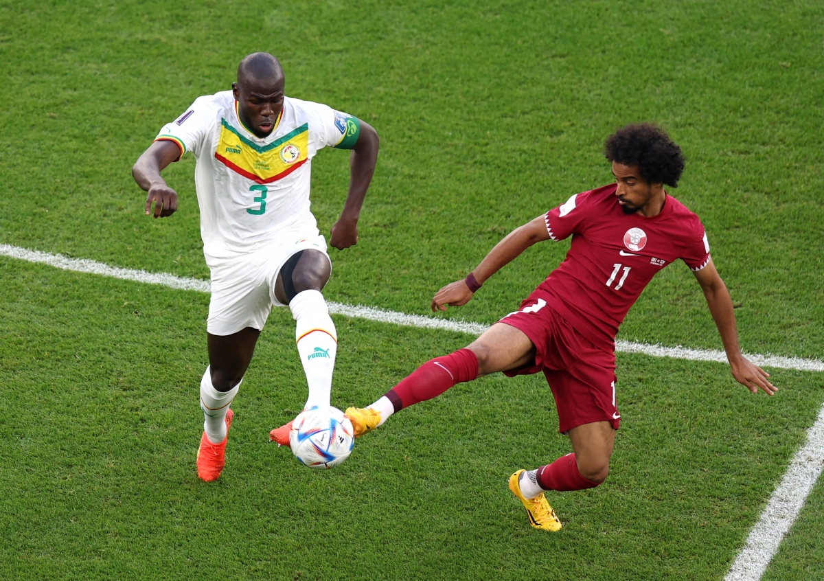 Qatar mất oan quả phạt đền trước Senegal, cựu trọng tài FIFA Võ Minh Trí nói gì? - Ảnh 1.