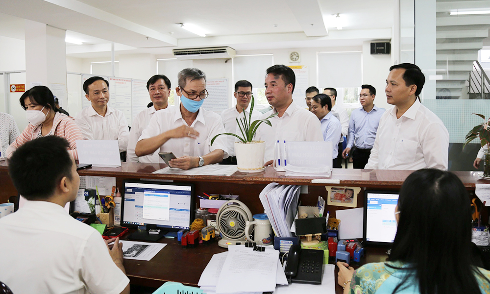 Thí điểm triển khai tiện ích đặt lịch làm việc  tại BHXH TP. Hồ Chí Minh và BHXH tỉnh Bình Dương  - Ảnh 1.